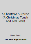 Board book A Christmas Surprise (A Christmas Touch and Feel Book) Book