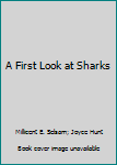Paperback A First Look at Sharks Book